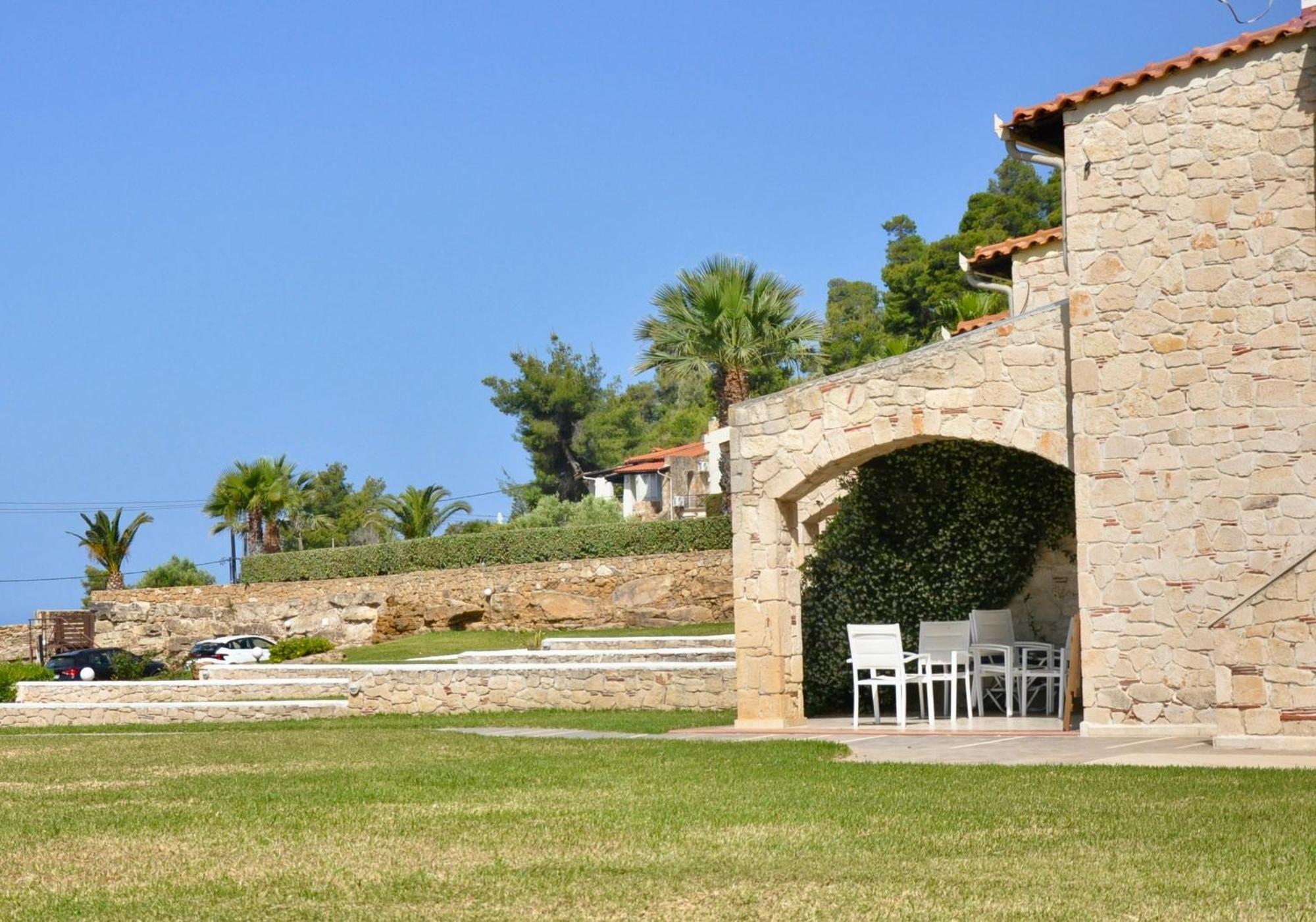 Stigmes Villas & Suites Nea Skioni Buitenkant foto